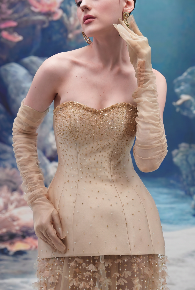 Beige KAILANI royal taffeta, tulle, and organza gown by 21Six, featuring elegant layers and intricate fabric details.