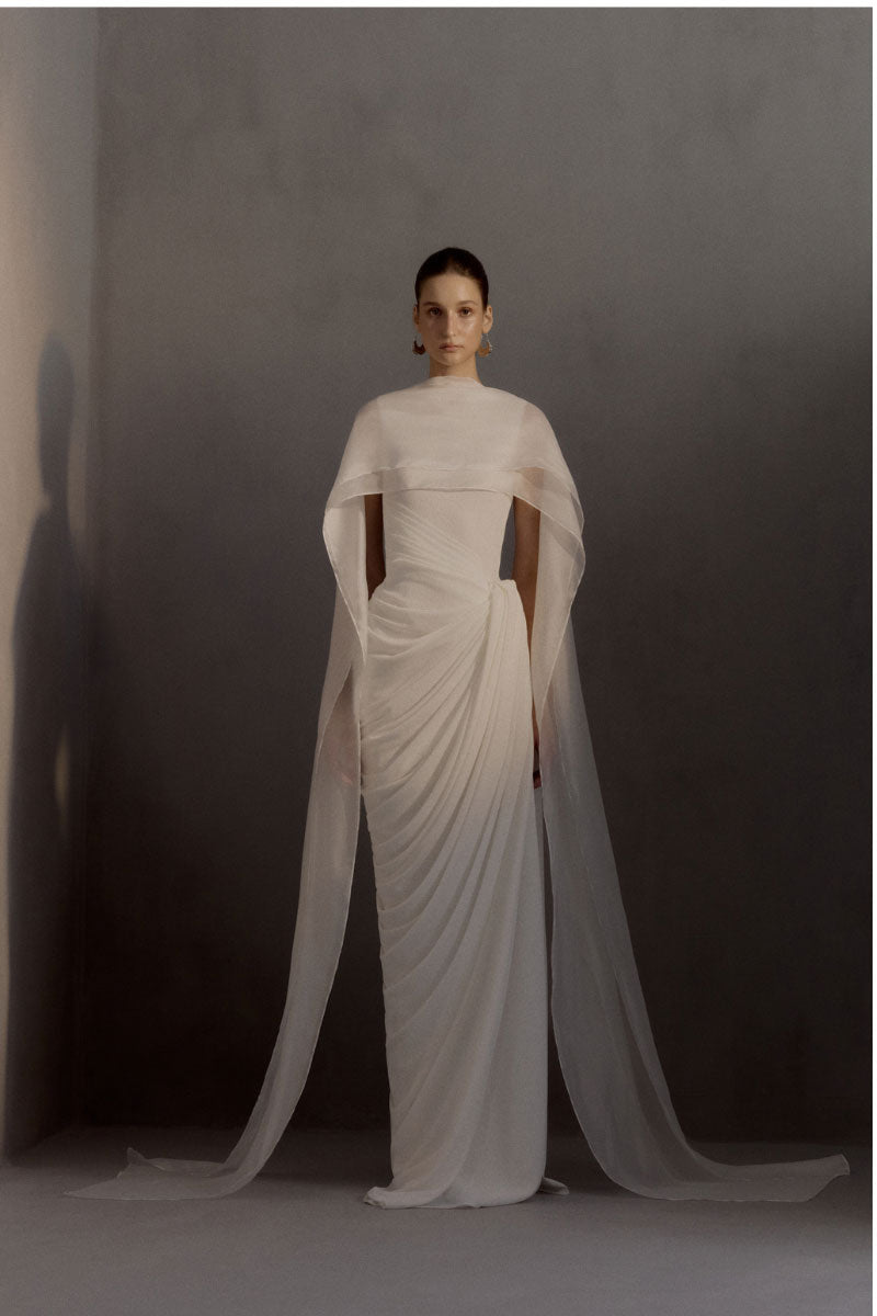 White Plan Regent Dress gown featuring elegant fabric and a flowing silhouette, perfect for formal occasions.