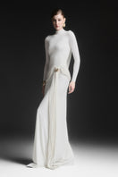 White Maison Des Copains Corvina draped floor-length gown with flowing fabric and elegant design, perfect for formal occasions.