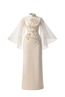Rosee de Matin The Cape Blossom gown, elegant floral silk gown with flowing silhouette and detailed lace accents.