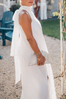 Adriana Castro LA BARCA MINI leather clutch in silver with sleek design and subtle sheen, perfect for elegant evening occasions.