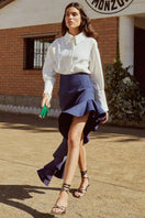 Señorita navy maxi skirt with flowing fabric and elastic waistband, styled with a relaxed fit for casual or dressy occasions.