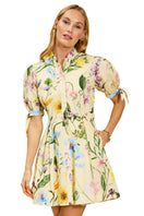 Mestiza New York Brooklyn Mini Dress in Blooming Vine pattern with floral print and fitted silhouette, displayed on a hanger.