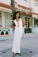 Off-white Bahia top by Summer Away, stylish sleeveless blouse with a relaxed fit and lightweight fabric for casual wear.