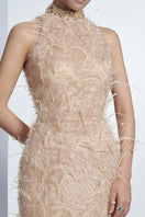 Beige feather gown by Happy Clothing, elegant and flowing evening dress with feather detailing and soft fabric.