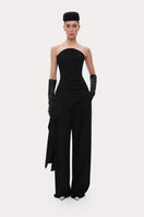 Black wool corset top by ELENAREVA, featuring a fitted design and structured details, shown on a neutral background.