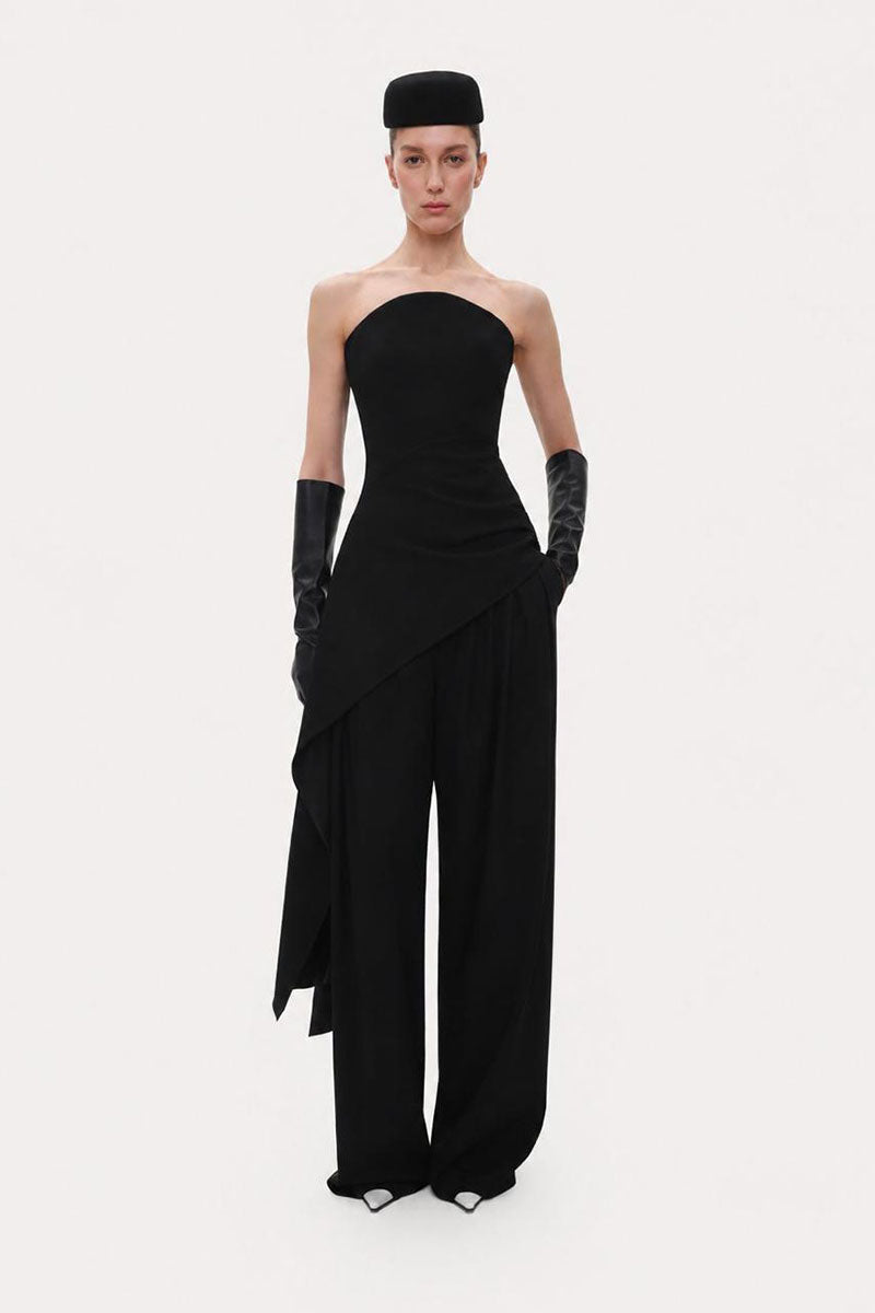 Black wool corset top by ELENAREVA, featuring a fitted design and structured details, shown on a neutral background.