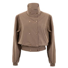Beige Kris Marán bomber jacket with high neck, stylish and warm, featuring modern design and comfortable fit.
