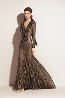 Valenciani black mermaid mesh dress, a stylish maxi dress with a fitted silhouette and sheer mesh fabric.