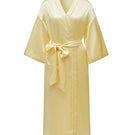 Not Just Pajama timeless collection silk robe in butter yellow, showing a luxurious silky robe with a relaxed fit and elegant design.