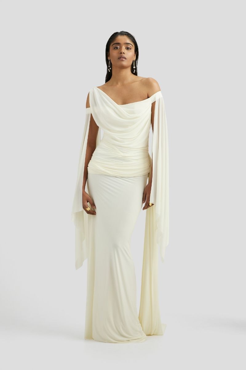 Deme By Gabriella Cynthia Maxi Dress in butter yellow, flowing maxi dress with a sleeveless design and elegant silhouette.
