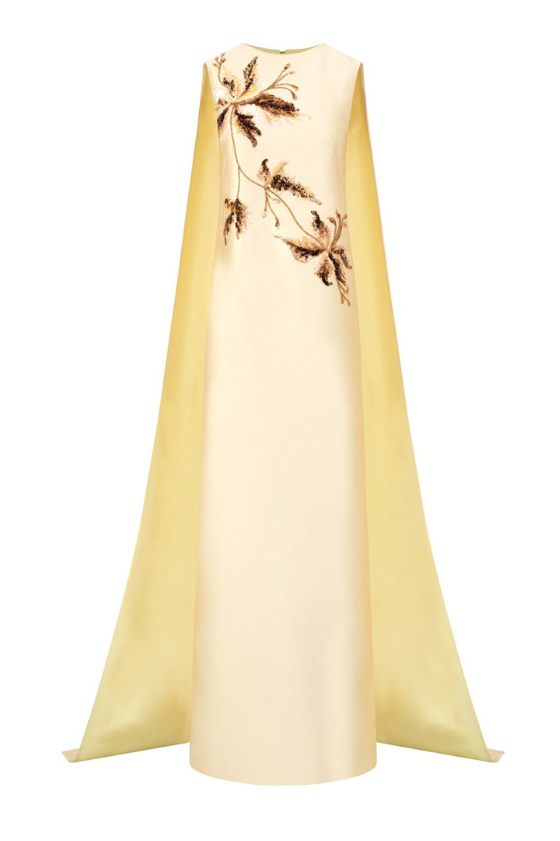 Elegant pale yellow taffeta gown by 21Six, featuring a flowing design and intricate details, perfect for formal occasions.