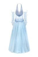 Light blue Muriel glitter tulle gown by 21Six with matching gloves, featuring a flowing design and elegant details.