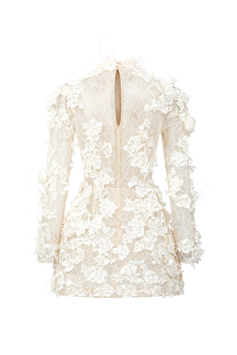 White Liliane lace mini dress by 21Six, featuring intricate lace details and a fitted silhouette on a model.