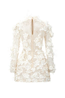 White Liliane lace mini dress by 21Six, featuring delicate lace fabric and a stylish, feminine silhouette.
