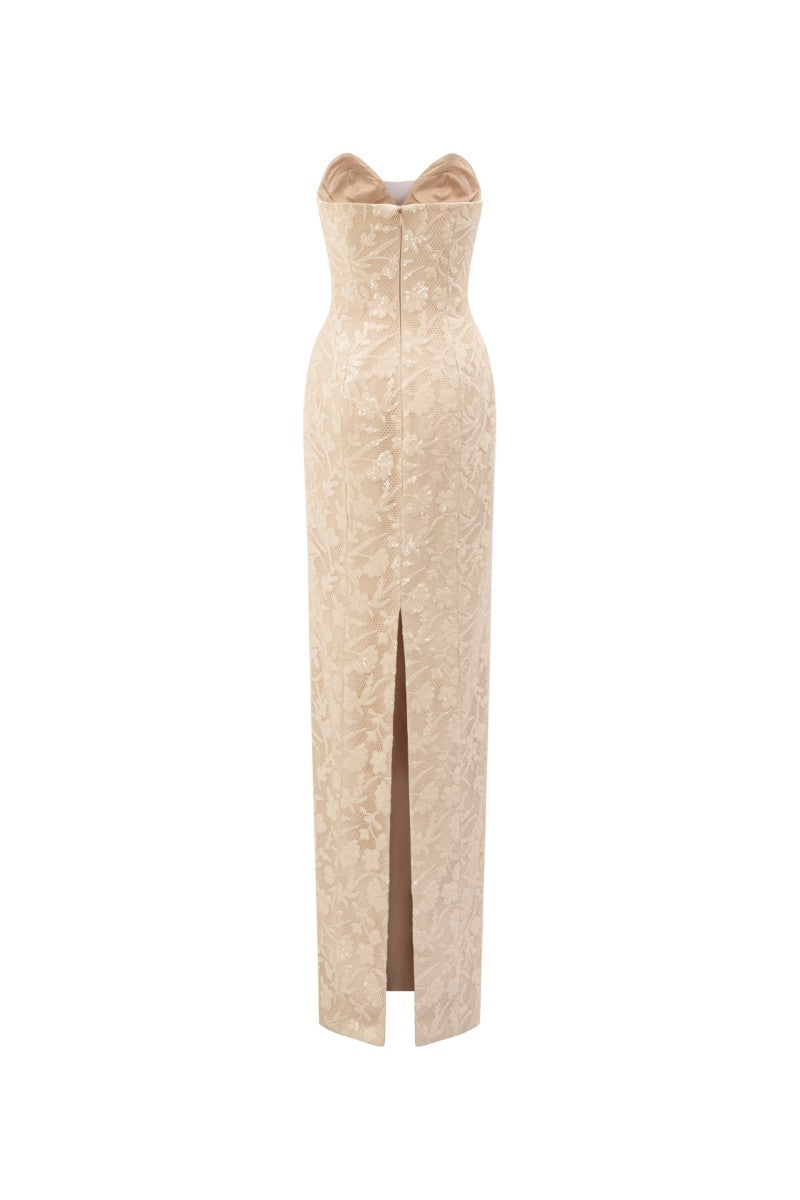 Beige lace gown by 21Six featuring intricate lace details and a flowing silhouette, perfect for elegant occasions.