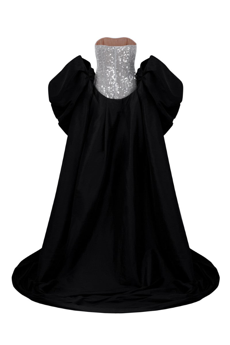 Elegant MOIRAE sequin gown paired with a Marisol taffeta cape, designed by 21Six, showcased in a stylish evening ensemble.