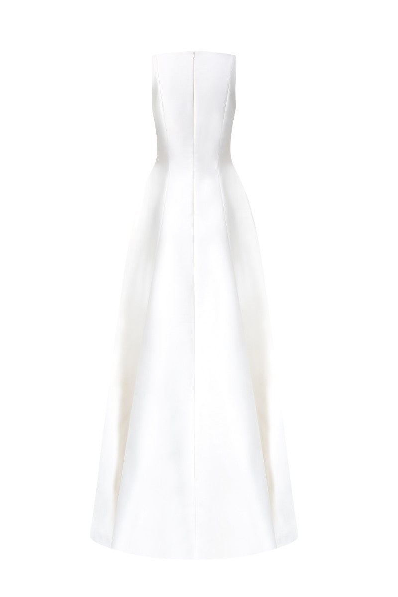 White Evelina Royal Taffeta gown by 21Six, elegant floor-length dress with a flowing design and intricate detailing in the image.