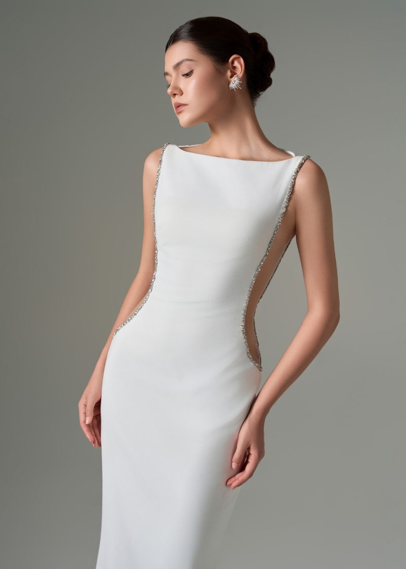 Elegant Fatima crepe cut-out gown by 21Six featuring a sleek silhouette and stylish cut-out details, perfect for formal occasions.
