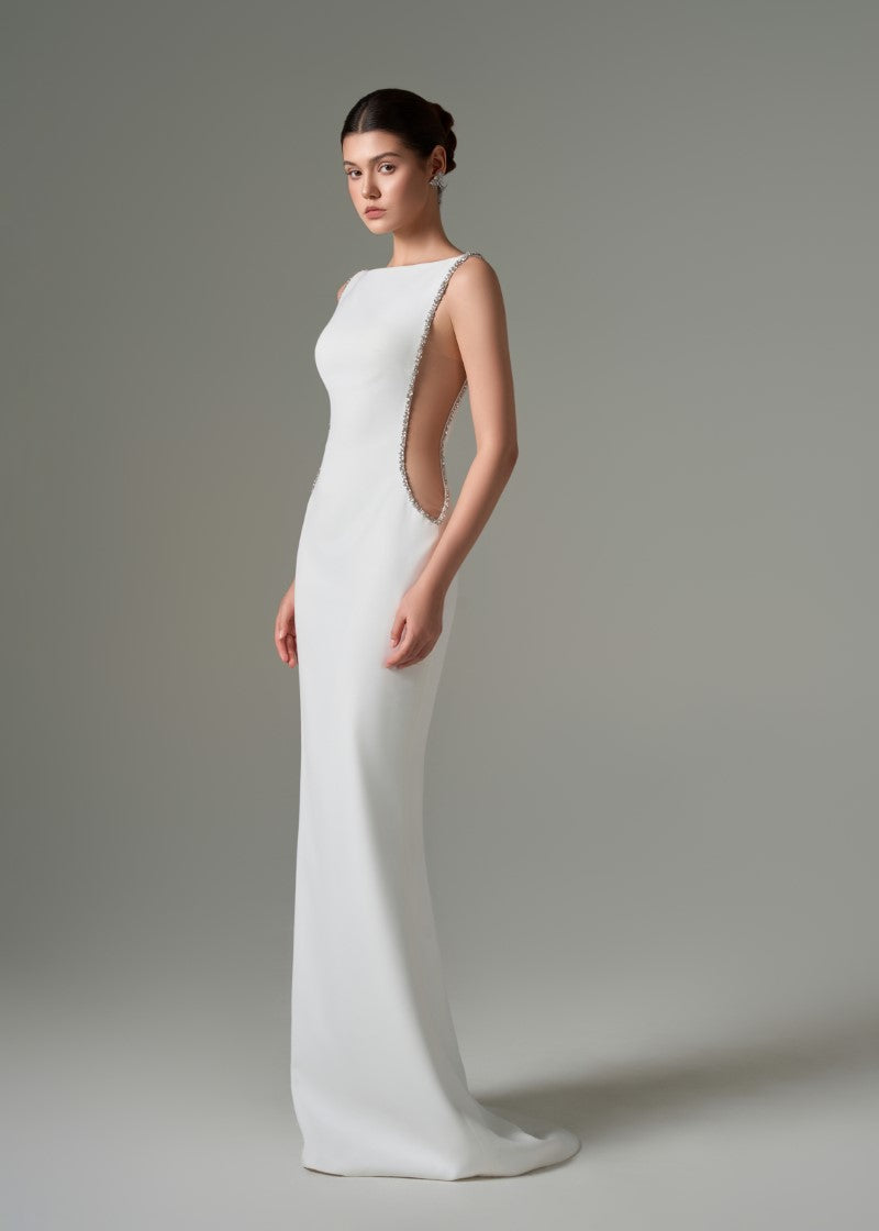 Elegant Fatima crepe cut-out gown by 21Six featuring a sleek silhouette and stylish cut-out details.