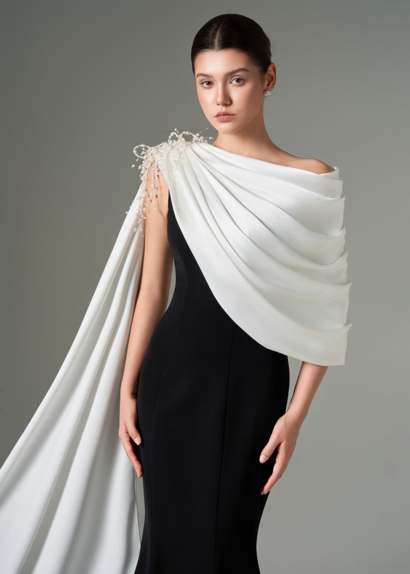 Negin crepe and silk fishtail gown by 21Six featuring a fitted silhouette and elegant drape in rich fabric.