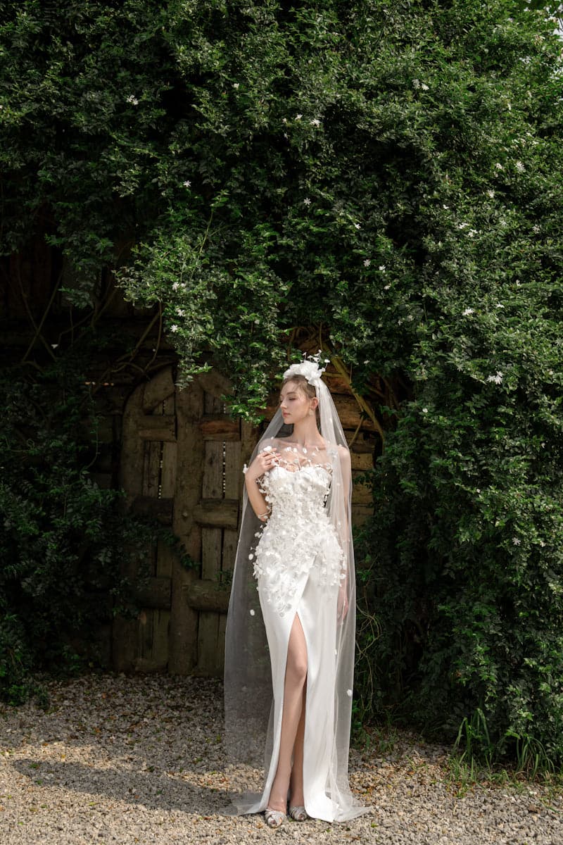 Elegant CULT MIA X 21Six Connie Silk Satin Flowers Gown with floral details and flowing fabric, perfect for formal occasions.
