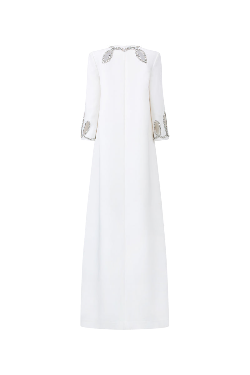 Elegant ADELA crepe cut-out gown by 21Six featuring a fitted silhouette and stylish cut-out details.