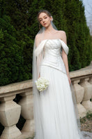 Elegant CULT MIA X 21Six Helena taffeta pleated gown with a flowing silhouette, featuring intricate pleats and a sophisticated design.