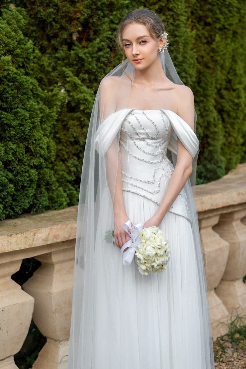Elegant CULT MIA X 21Six Helena taffeta pleated gown with a flowing silhouette and intricate detailing, perfect for formal occasions.