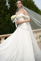 Elegant CULT MIA X 21Six Helena taffeta pleated gown with a flowing silhouette and intricate pleat details.
