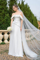 Elegant CULT MIA X 21Six Helena taffeta pleated gown with a flowing silhouette and intricate pleats, perfect for formal occasions.