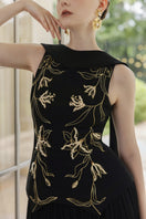 Black crepe and chiffon gown by 21Six, featuring flowing fabric and elegant design, perfect for formal occasions.