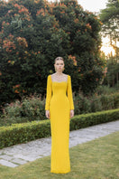 Elegant Elise Crepe Gown by 21Six featuring a flowing design and sophisticated silhouette, perfect for formal occasions.