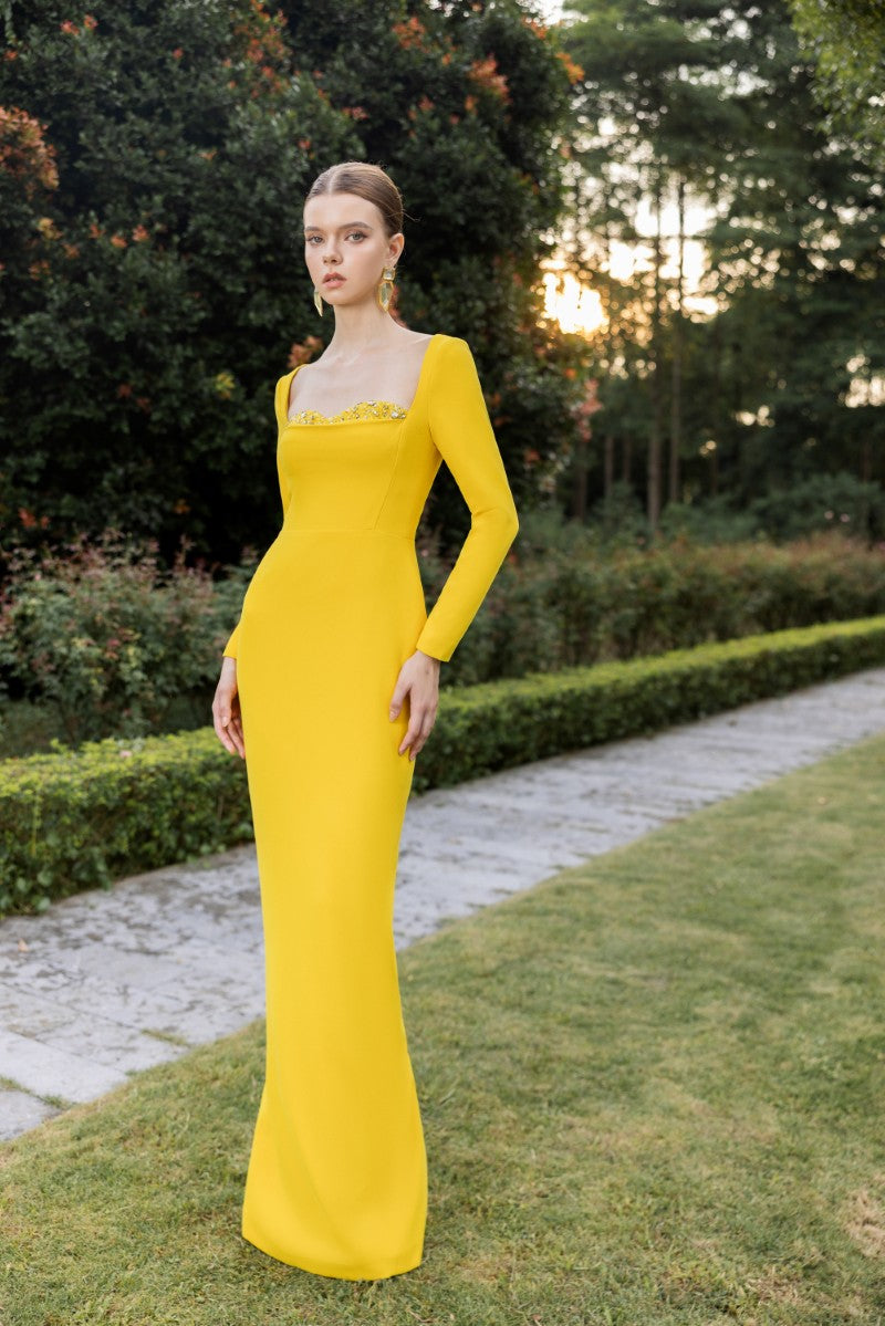 Elegant Elise Crepe Gown by 21Six featuring a flowing silhouette and delicate fabric, perfect for formal events.