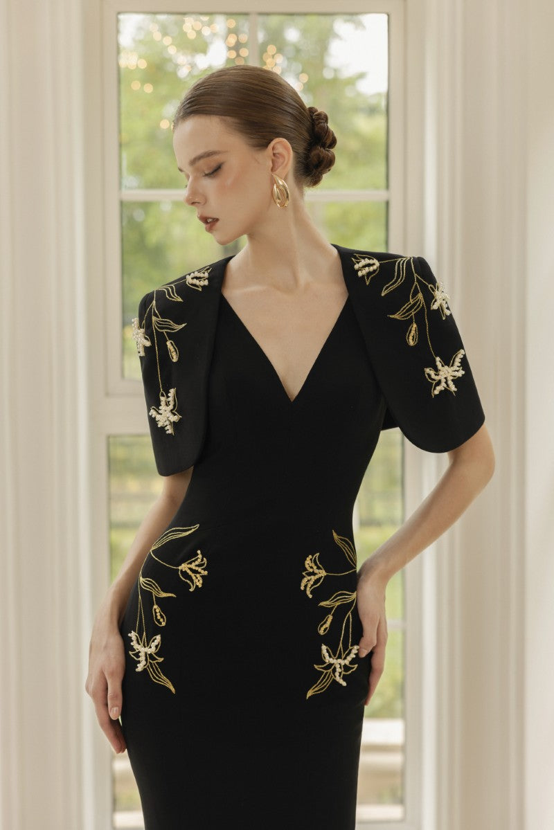 Black Isabelle crepe gown with Emmanuellette cape by 21Six, elegant evening wear with flowing fabric and sophisticated design.