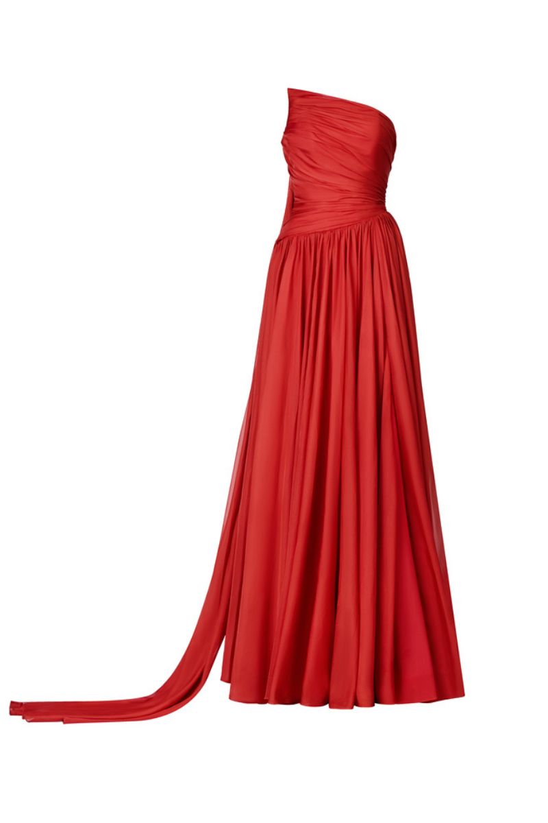 Red pleated gown with cape by HACCHIC COUTURE, elegant evening dress featuring flowing fabric and sophisticated design.