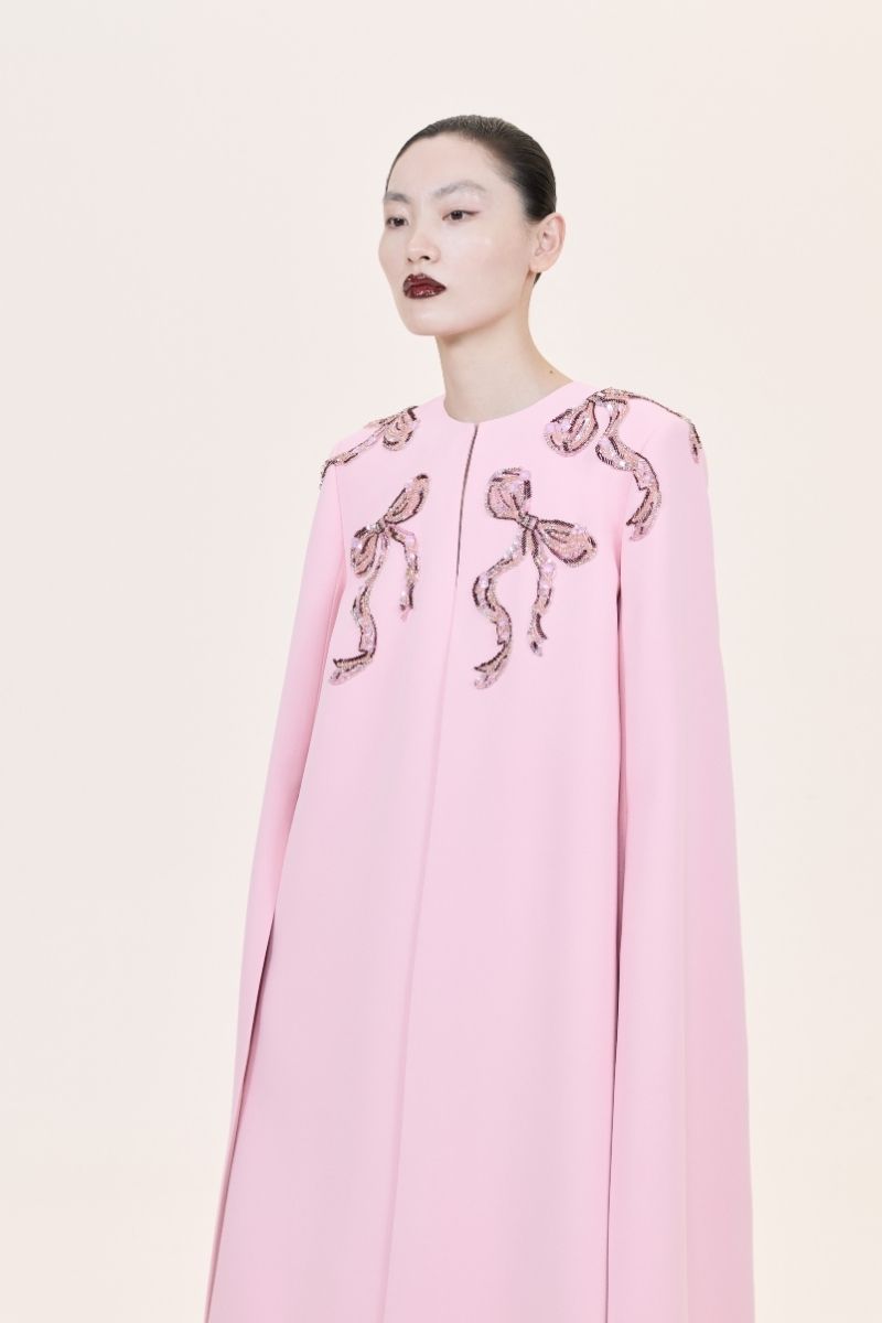 Nihan Peker Aura Pink Cape Gown featuring flowing fabric and elegant design, perfect for formal occasions.