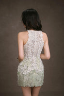 Keira Tong Gardenia lace mini dress with intricate floral design and delicate lace details, perfect for elegant occasions.