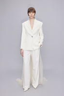 Sudi Etuz blazer featuring a tailored design with a full-length tulle train at the back, elegant and stylish for formal occasions.