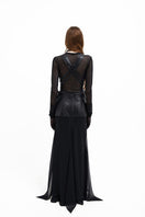 Black leather vest with belt by Vaska, featuring detailed stitching and a stylish, fitted design, shown on a model.