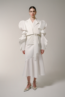 Liya Seaside Breeze Midi Skirt with flowy fabric and seaside-inspired pattern, shown on a hanger in neutral lighting.