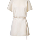 Light ivory Bloom mini dress by Leicia featuring a fitted silhouette and delicate fabric, perfect for warm-weather occasions.