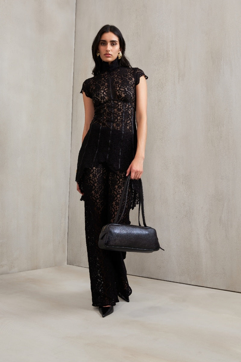Black Carly co-ord set by Deme By Gabriella featuring a stylish matching top and pants ensemble.