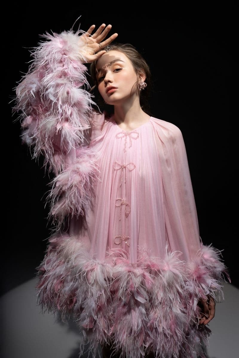 Pink Annie chiffon funnel mini dress by 21Six, featuring a flowy chiffon fabric and a stylish funnel neckline, shown on a model.