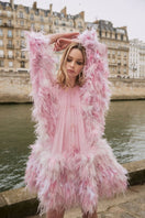 Pink Annie chiffon funnel mini dress by 21Six, featuring a flowy silhouette and stylish neckline, displayed on a hanger.