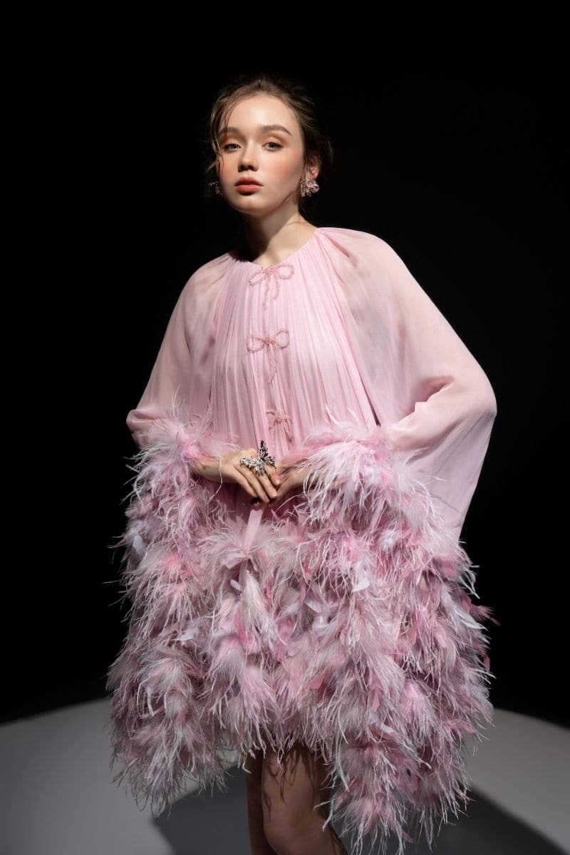 Pink Annie Chiffon Funnel Mini Dress by 21Six, featuring a flowy chiffon fabric and a stylish funnel neckline, displayed on a hanger.