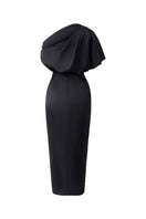 Pink co-ord set featuring a draped asymmetrical top and knotted skirt from 21Six, styled together for a chic look.