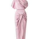 Pink co-ord set featuring a draped asymmetrical top and knotted skirt from 21Six, stylish and modern women's fashion ensemble.