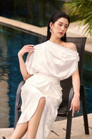 Pink co-ords set featuring an Aubrie draped asymmetrical top and Jessie knotted skirt by 21Six, stylish and modern women's fashion.