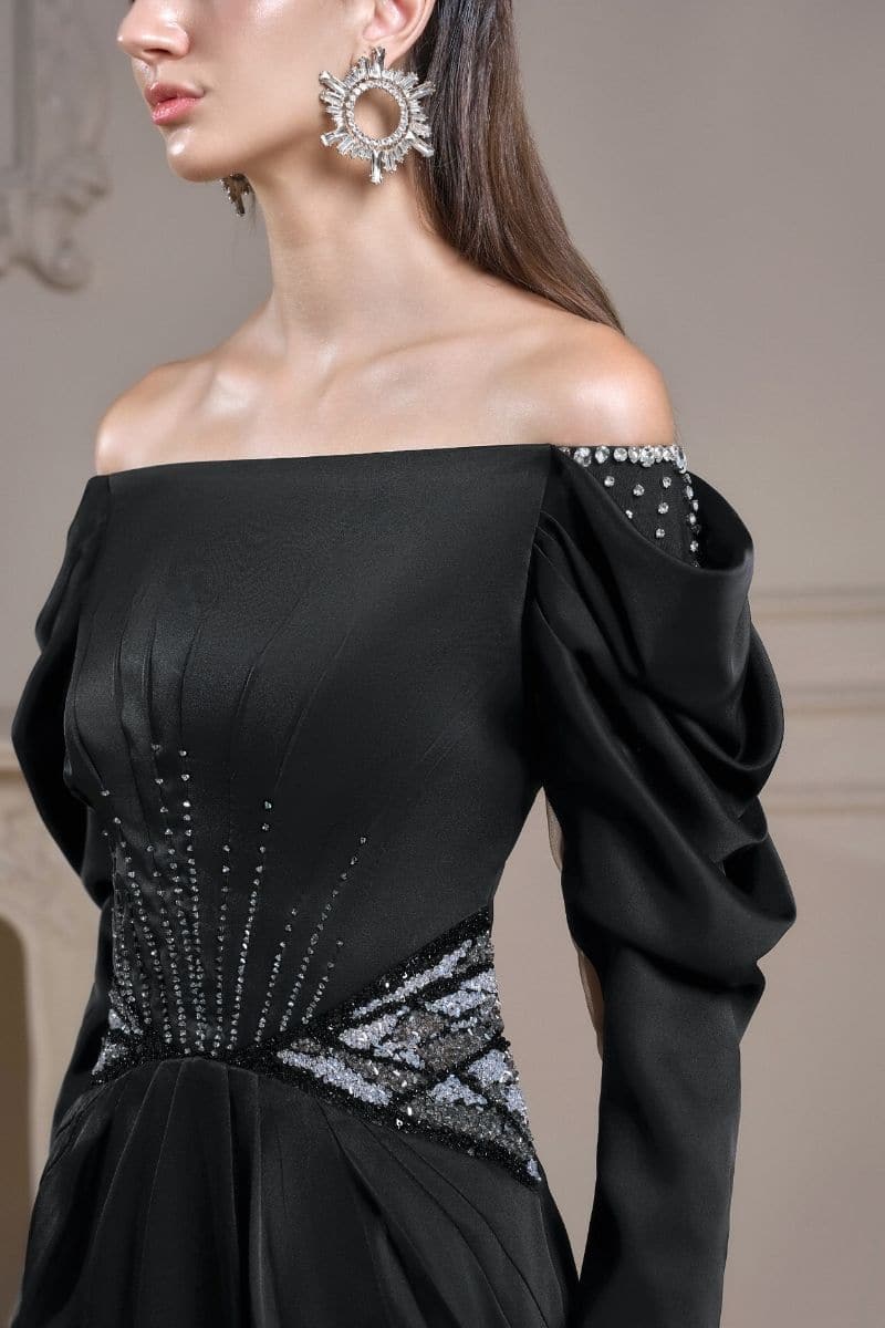 Black silk satin gown with draped sleeves, featuring a fitted silhouette and elegant design by 21Six.